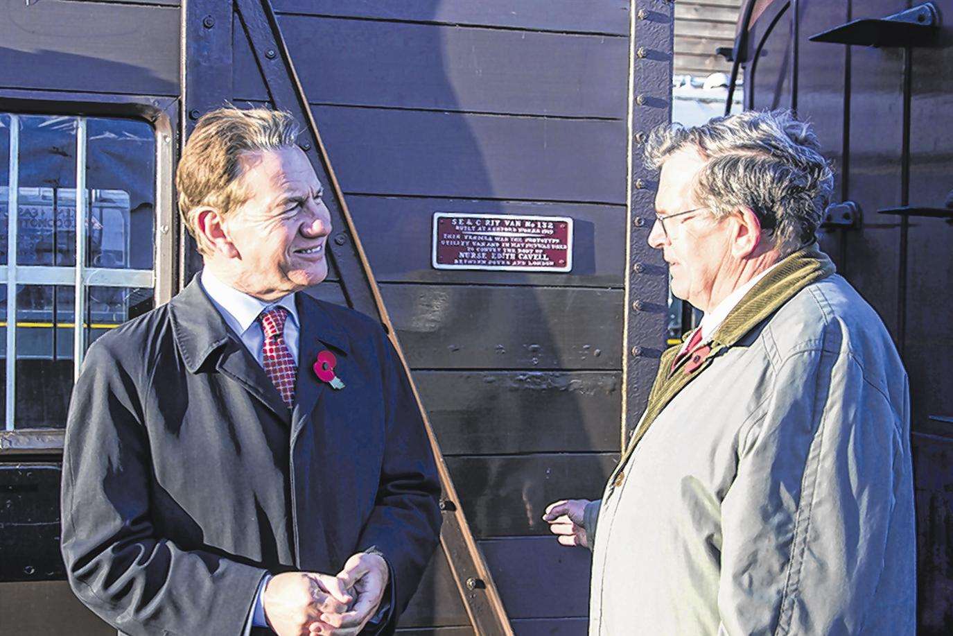 TV presenter and former cabinet minister Michael Portillo (left) chats to Brian Janes, curator of the Kent & East Sussex Railway's Cavell Van