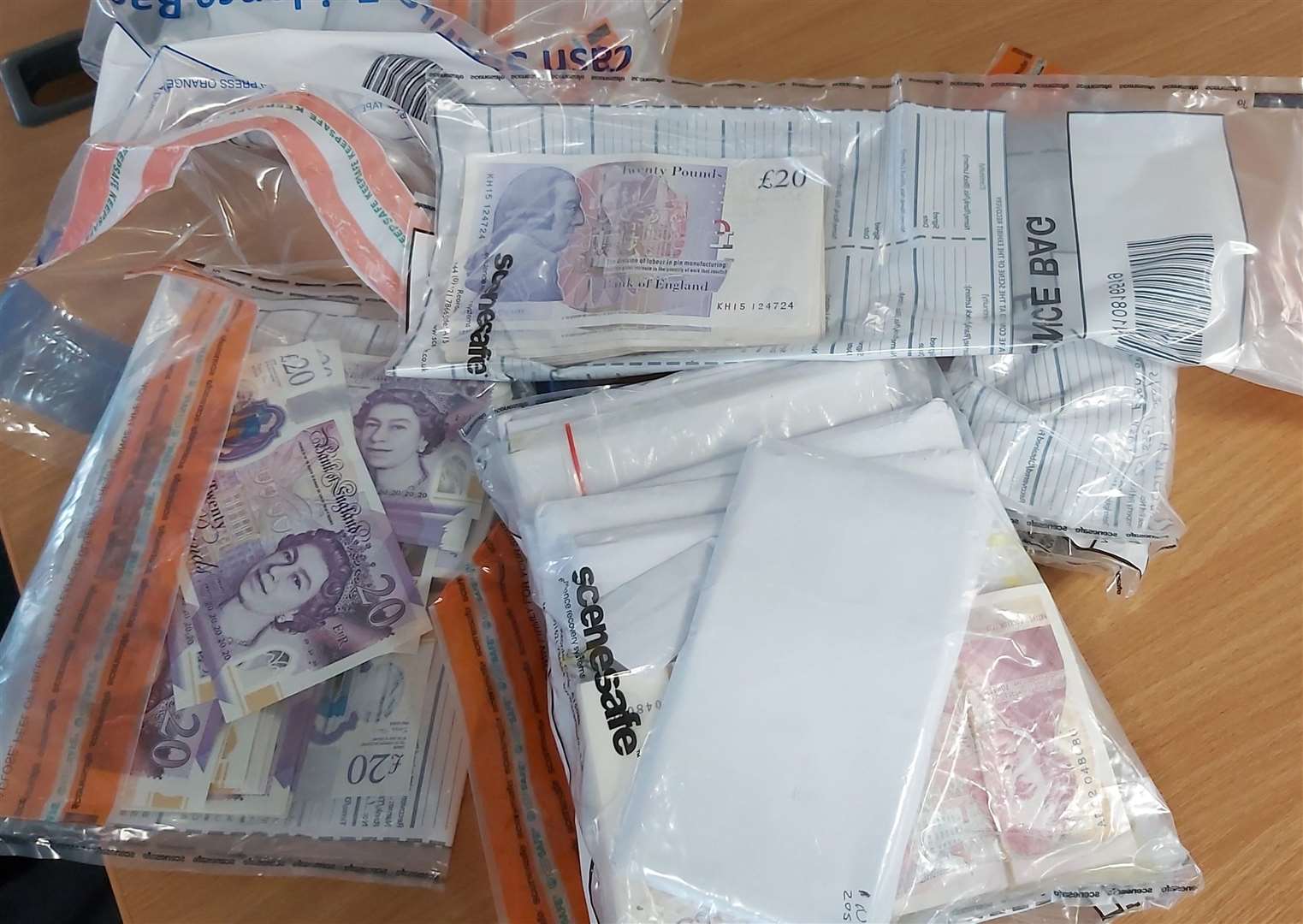 Officers made two arrests after drugs, money and weapons were found at an address in Thanet. Picture: Kent Police