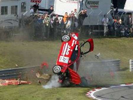 John George's car on its side at Brands Hatch