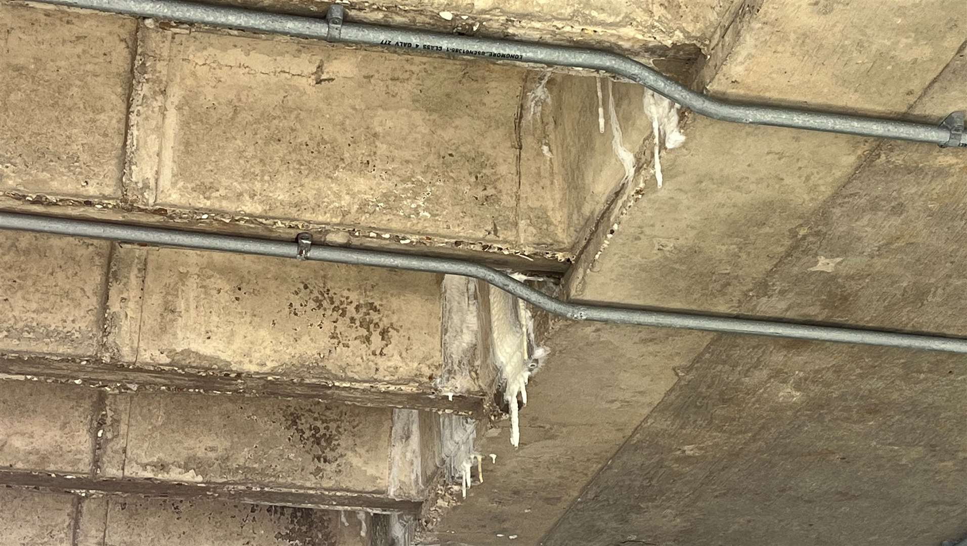 White stalactites hanging from the ceiling of the car park have now been removed
