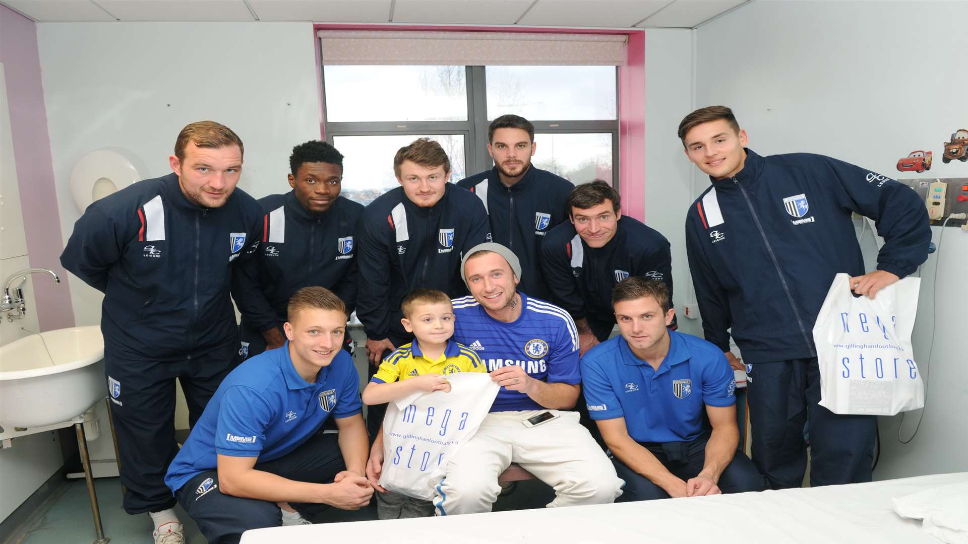 Gills stars met six-year-old Harry Parked and his dad Neal on the hospital's Dolphin ward