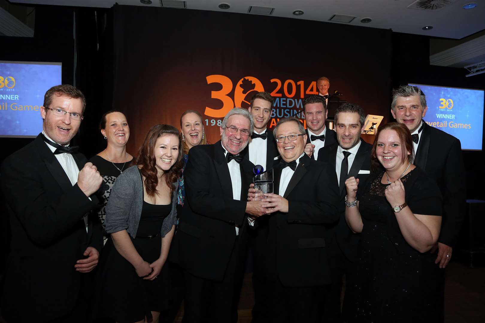 David Jones, awards founder, with Paul Jackson and his team at Dovetail Games, Medway Business of the Year