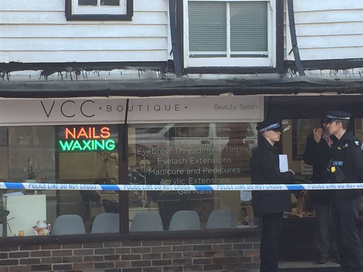 Police outside the nail bar in Tonbridge High Street after the incident