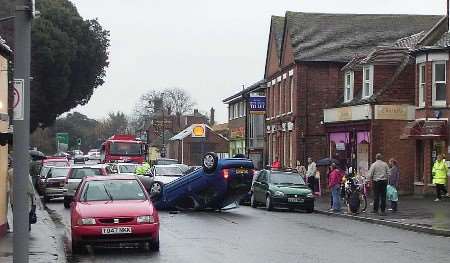 The scene shortly after the car rolled over. Picture courtesy Appletons Estate Agents