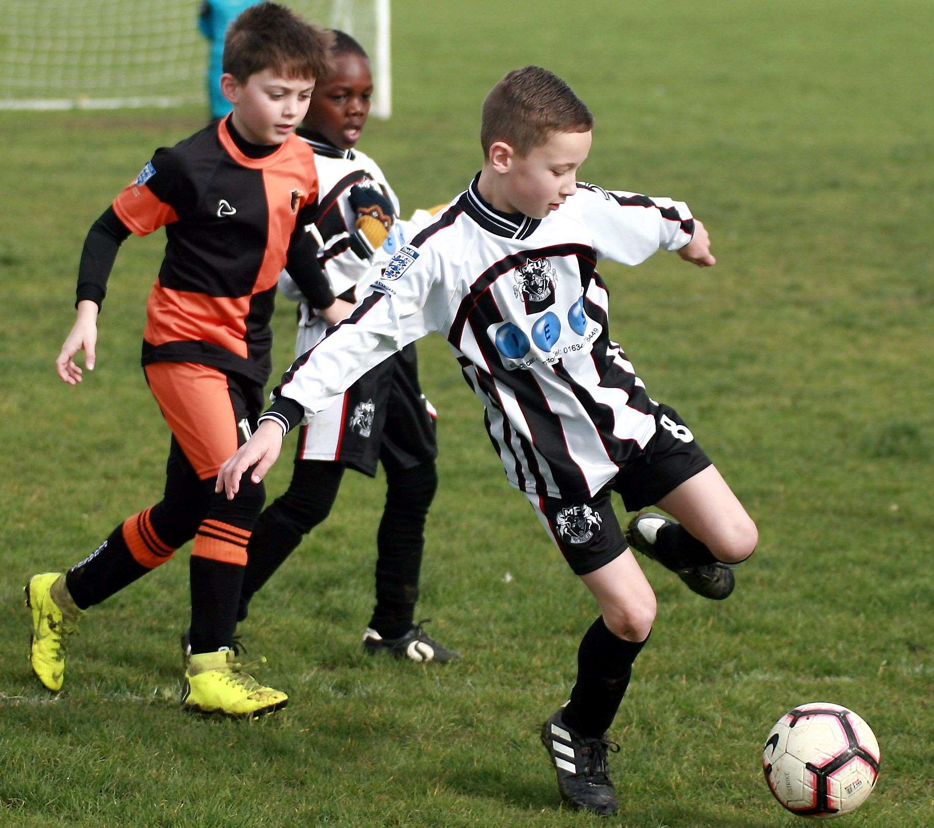 Milton & Fulston (black and white) under-8s take on Pegasus under-8s. Picture: Phil Lee FM29961689