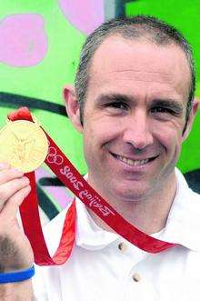 Olympic champion to receive his MBE