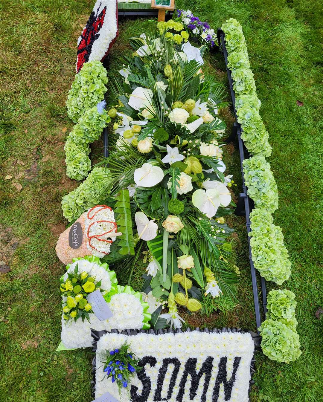 Flowers of Oli’s favourite things have been laid by his grave. Picture: The Life Narrator