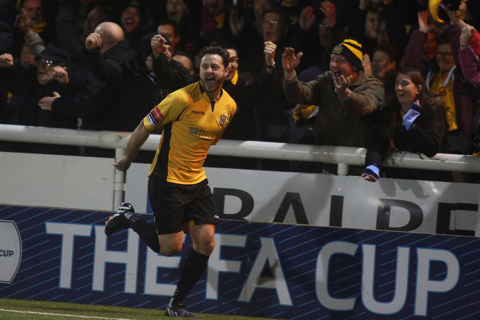 Frannie Collin celebrates his opener in the replay win over Stevenage Picture: Martin Apps
