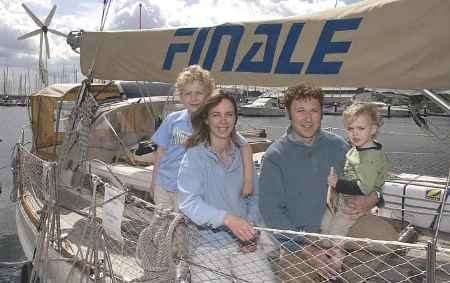 NEW HORIZONS: The Calver family on their boat in Chatham Maritime Marina. Picture: PAUL DENNIS