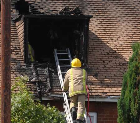 A firefighter at the scene of the blaze. Picture: Mike Smith