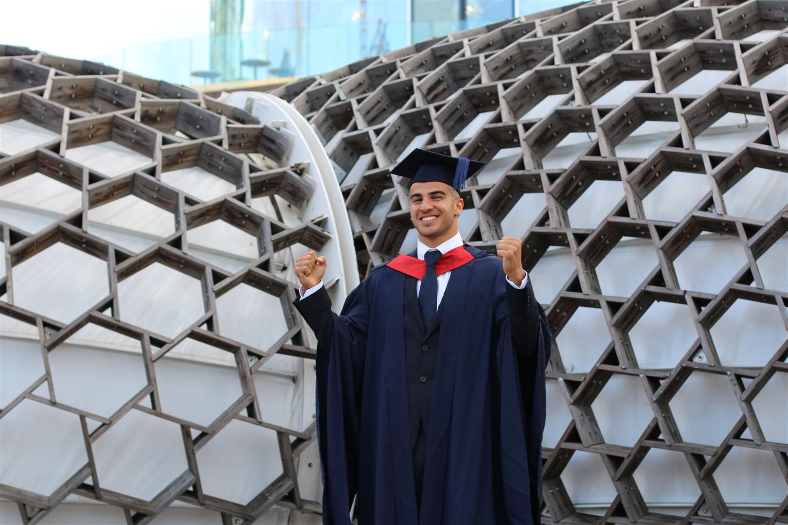 Adam Gemili jetted in from a Qatar training camp for his graduation ceremony in London.