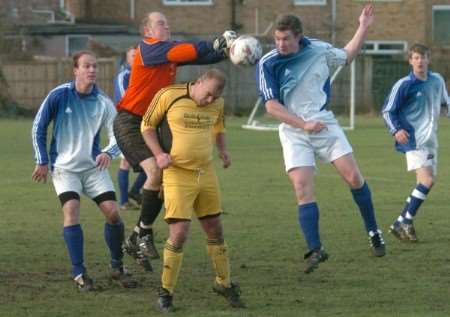 White Colts Athletic (blue/white) on the attack against Red Lion Reserves