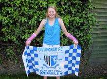 Gillingham assistant manager Scott Barrett's daughter, Sophie, who broke both her arms in a fall while playing on a swing