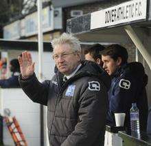 New Dover Athletic manager Chris Kinnear acknowledges the fans at Crabble.