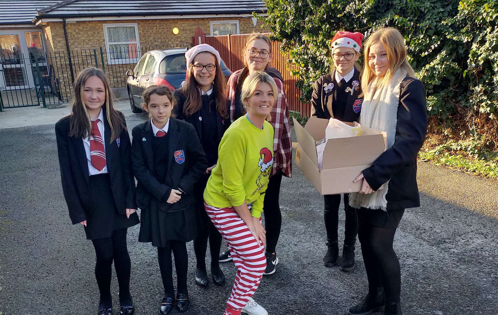 Pupils from Oasis Academy Isle of Sheppey delivering Christmas gifts to the elderly