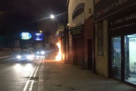 The blaze was outside a tyre shop. Pic: @DawsonScott22