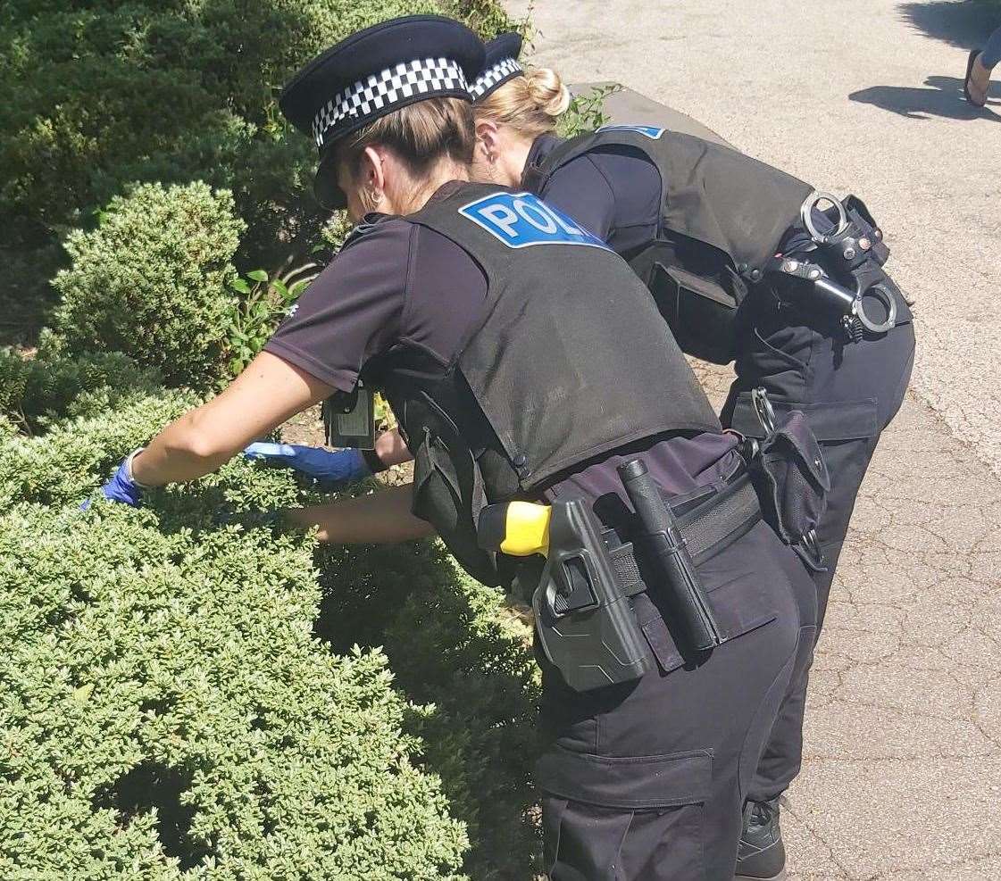 Officers search for hidden weapons. Pic: Kent Police