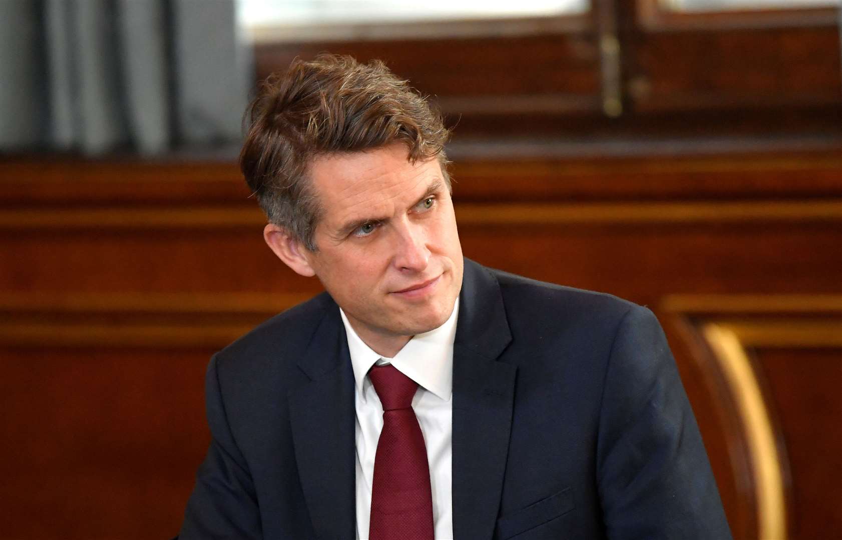 Education Secretary Gavin Williamson is considering longer school days and a shorter summer holiday to help pupils catch up (Toby Melville/PA)