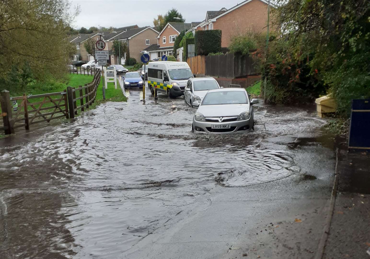 Cars are under water in Spot Lane, Maidstone