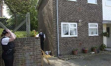 Police outside the property where the body was discovered. Picture: TERRY SCOTT