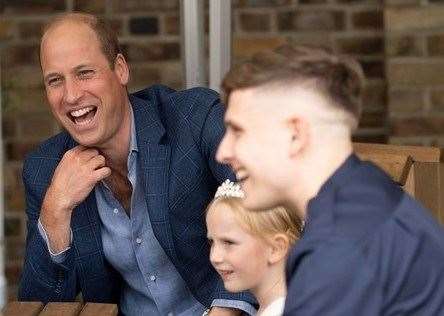 Firefighter James Knight, five-year-old Lila Page from Rainham, who was rescued by James and his blue-light colleagues, and HRH Prince William. Picture: Kent Fire and Rescue Service