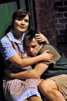 Maureen Nolan as Mrs Johnstone and Sean Jones as Mickey in Blood Brothers