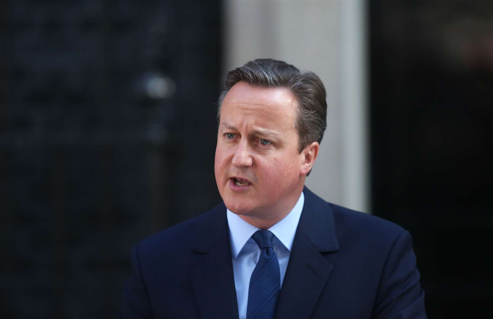 Prime Minister David Cameron announces his resignation after UK votes to leave the European Union, outside of 10 Downing Street.