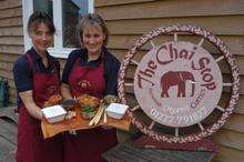 Tina Cesbron and Isabel Moore of the Chai Stop with some of the herbs used in their dishes