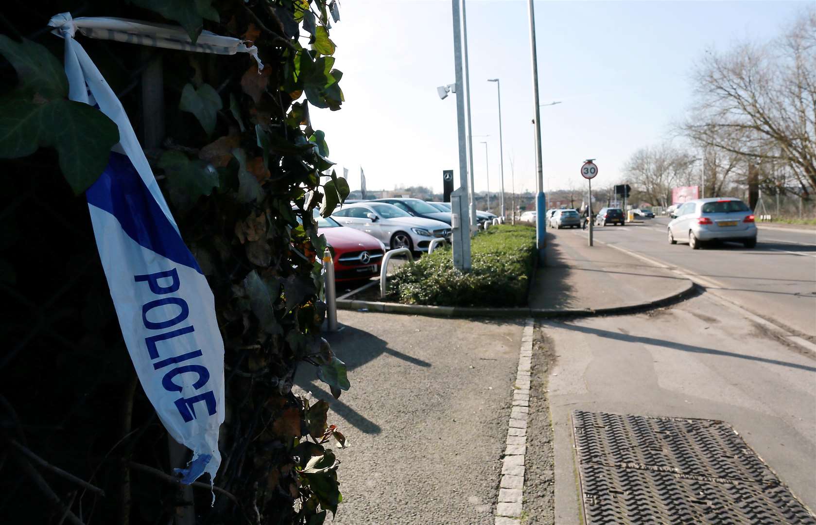 Police searched an area next to Mercedes-Benz Tonbridge after a stabbing on Saturday night. Picture: Phil Lee