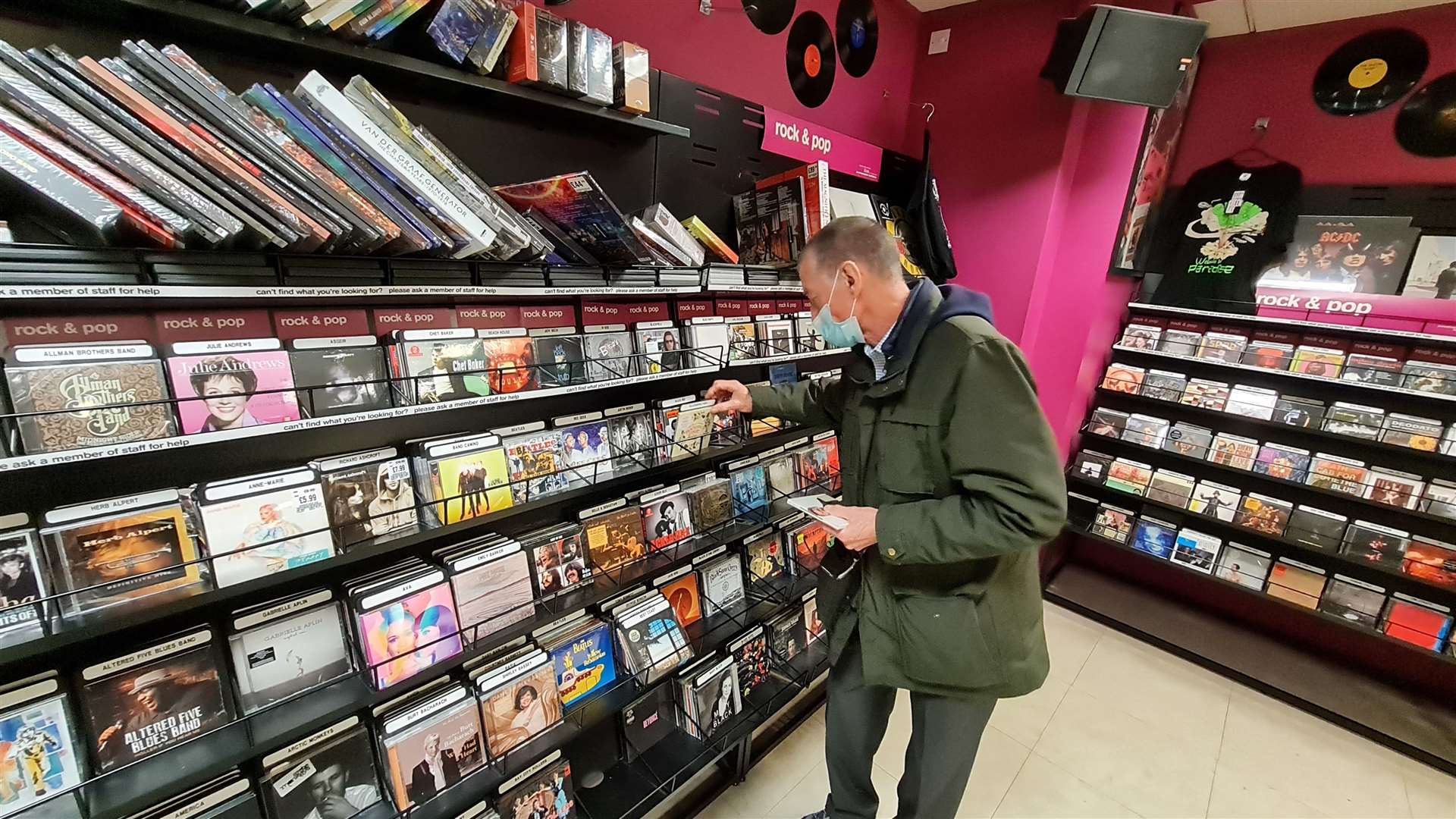 Loyal customer Jim Williams browses the selection of CDs - he has a collection of around 1,300
