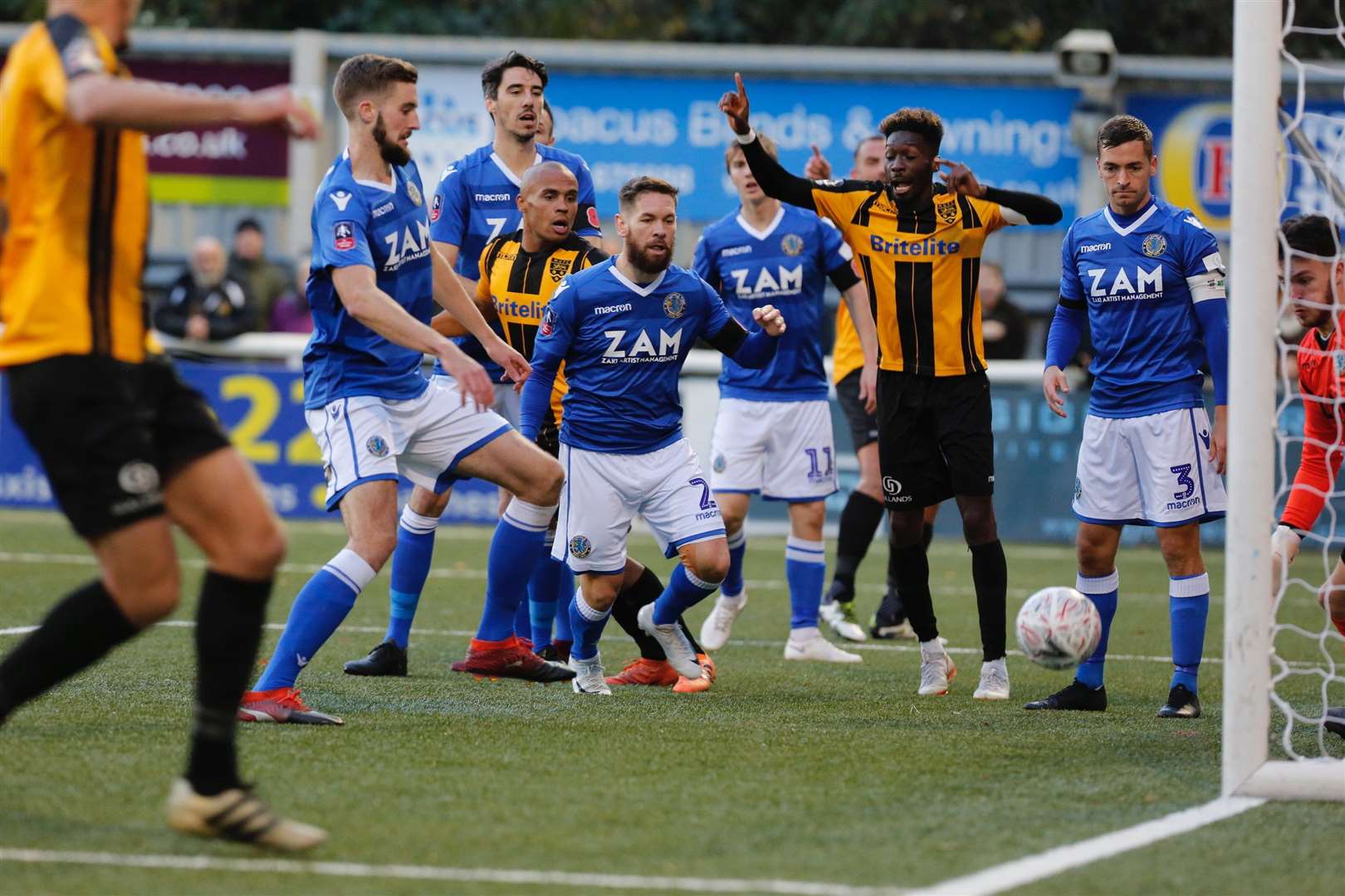 Maidstone players appeal after Elliott Romain's header goes in and comes back out Picture: Matthew Walker