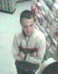 Detectives are hunting this man after a female shopworker was attacked by a lager lout in Ramsgate