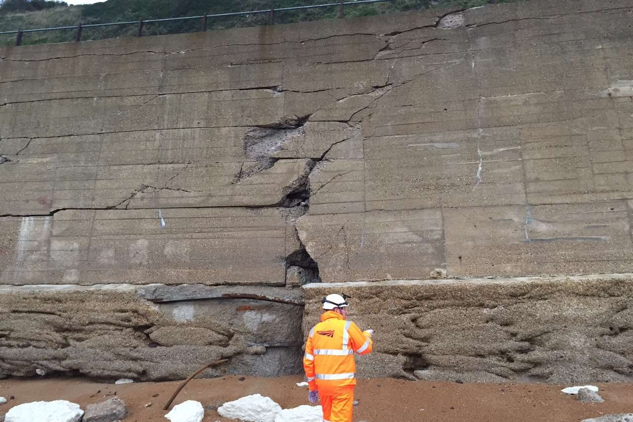 Engineers have been inspecting the damage to the sea wall and railway line. Picture: Network Rail