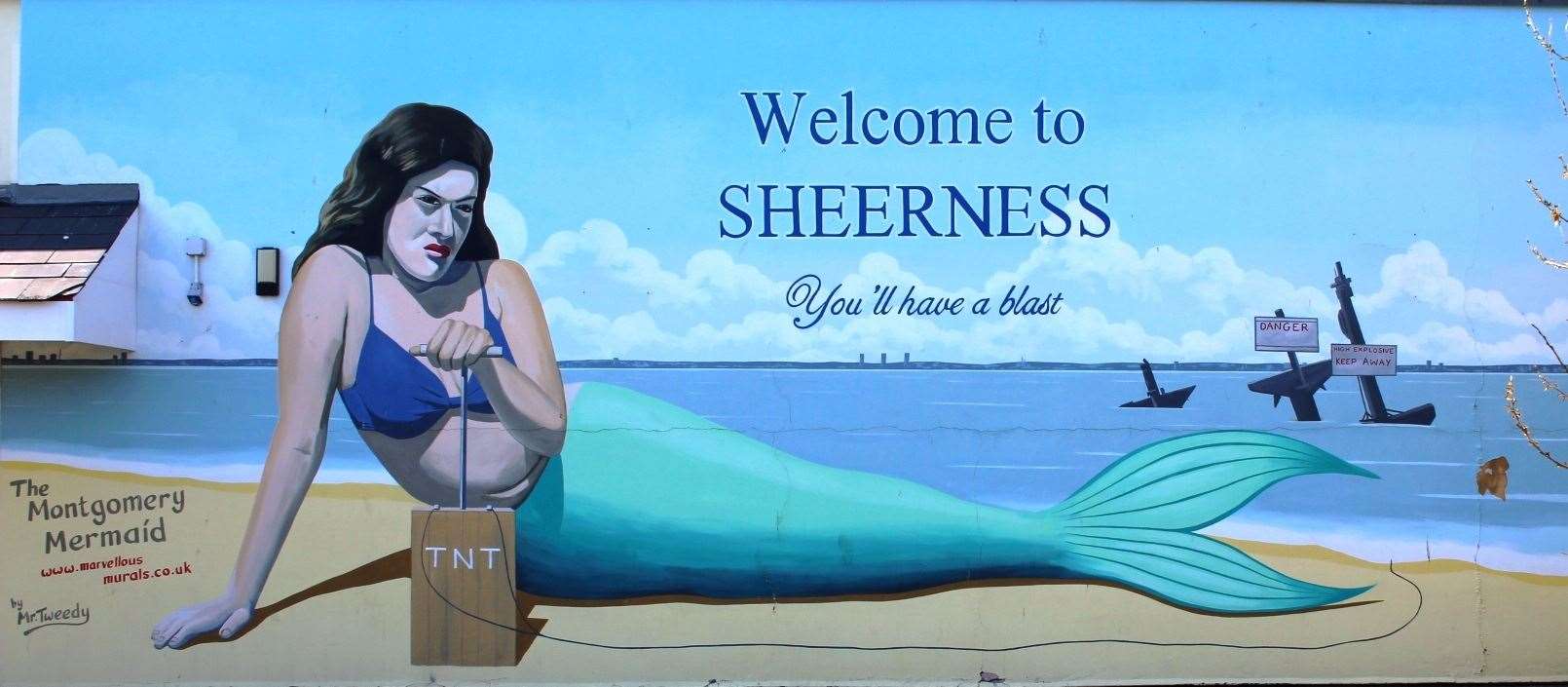 Artist Dean Tweedy left no one in doubt what he thought should be done to the wreck of the Richard Montgomery bomb ship when he painted this moody mermaid mural at Sheerness