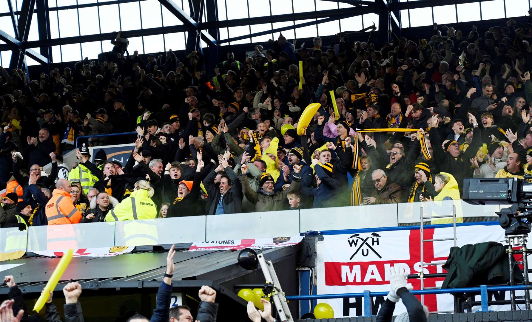 Maidstone fans celebrate their winning goal at Portman Road. Picture: Barry Goodwin