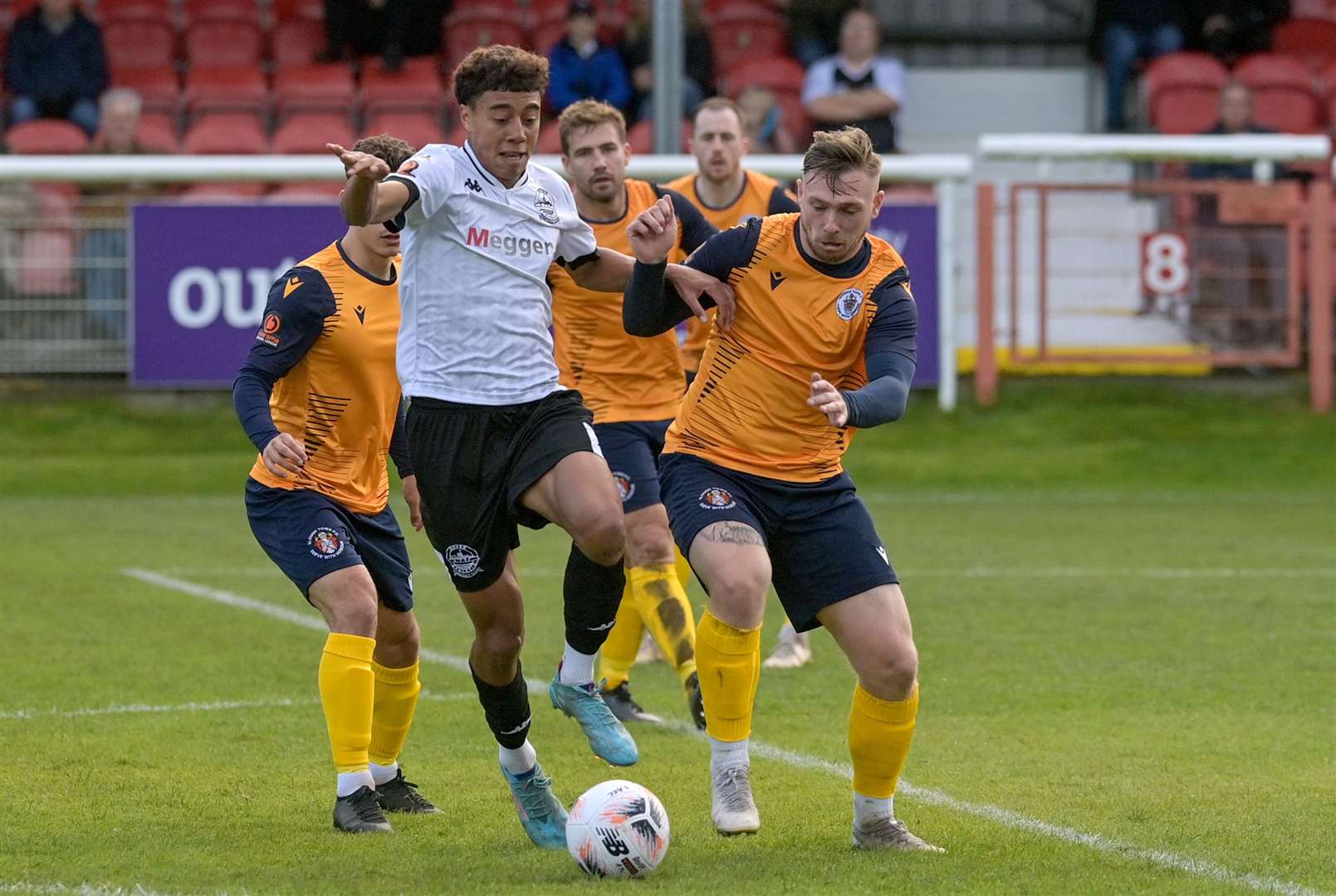 Dover Athletic's Luke Baptiste in the thick of the action. Picture: Stuart Brock