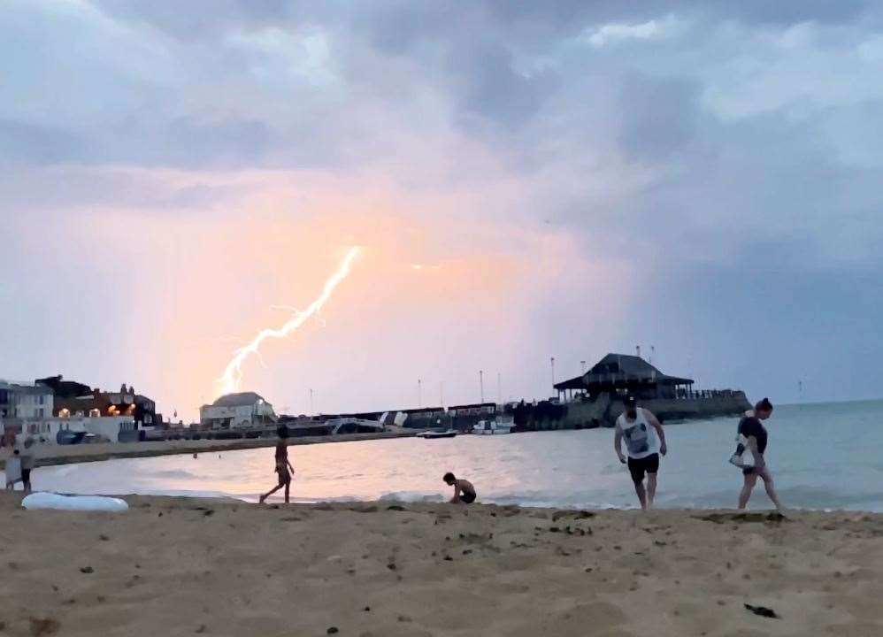 Lightning strikes on the horizon beyond Broadstairs Pier Picture: Damian Kurzeja