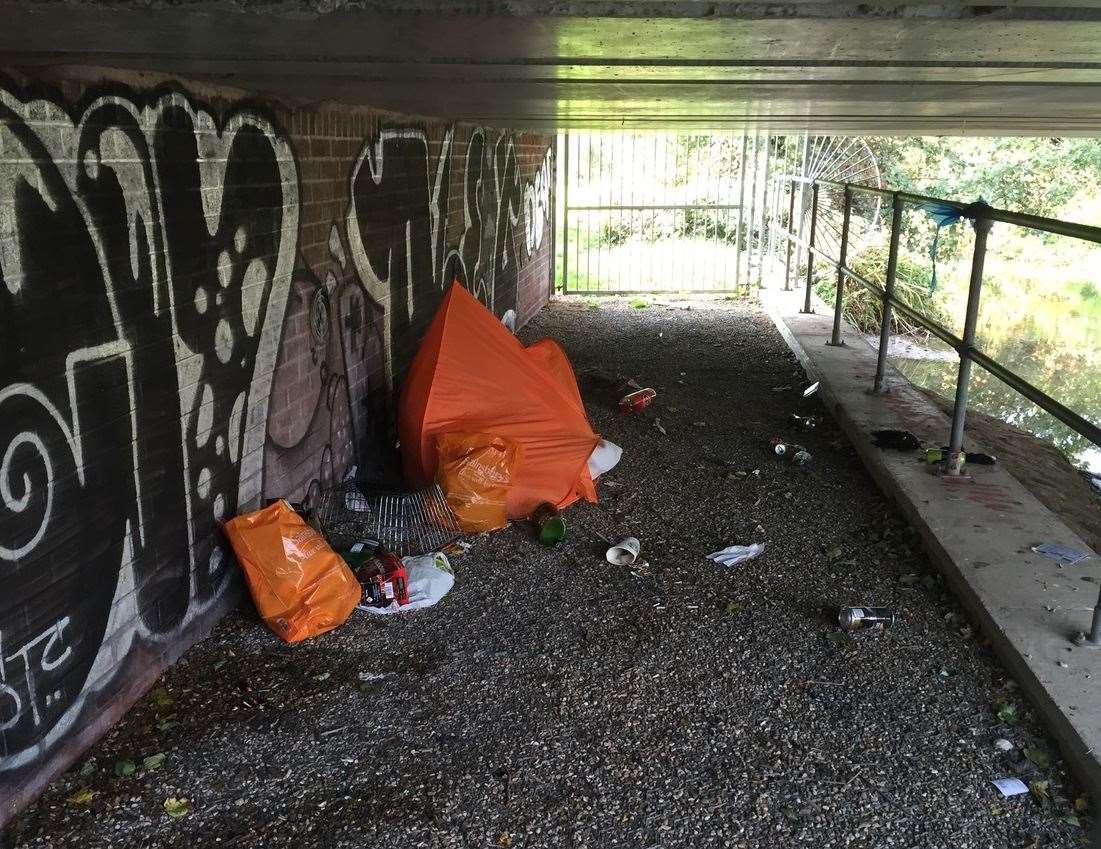 Rubbish and drug paraphernalia left under the bridge by Kingsbrook Park in Canterbury