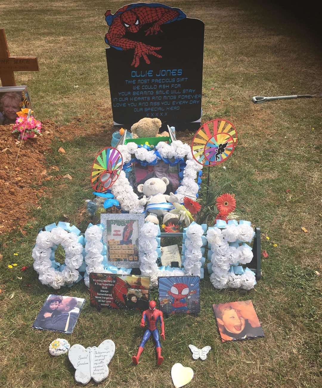 Lloyd Jones put up a temporary Spider-Man marker at his son Ollie's grave in Maidstone