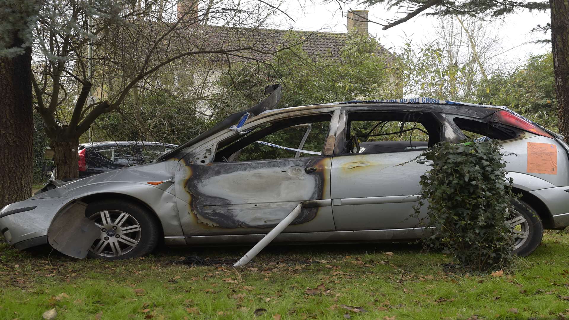 The burned out car had still not been removed on Tuesday afternoon