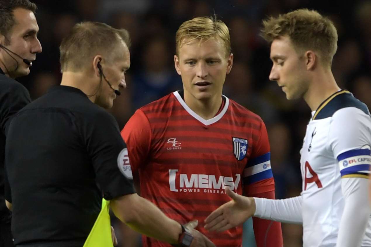 The captains meet the officials before kick-off as Gills prepare to take on Tottenham in the EFL Cup Picture: Barry Goodwin