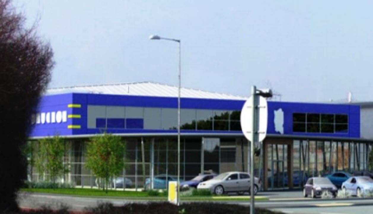 An original CGI of the plans when they included a car dealership