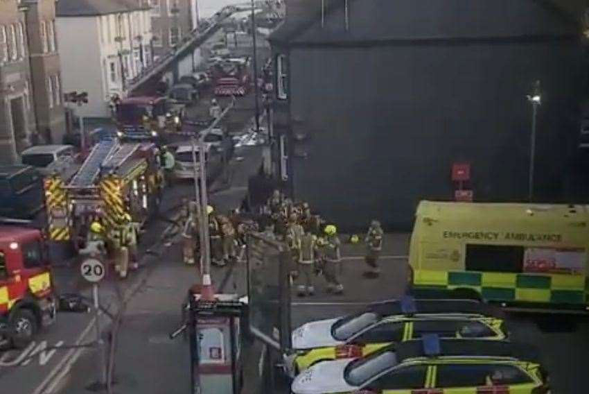 Six fire engines and an ambulance remain on site in Richmond Street. Picture: Oliver Martin
