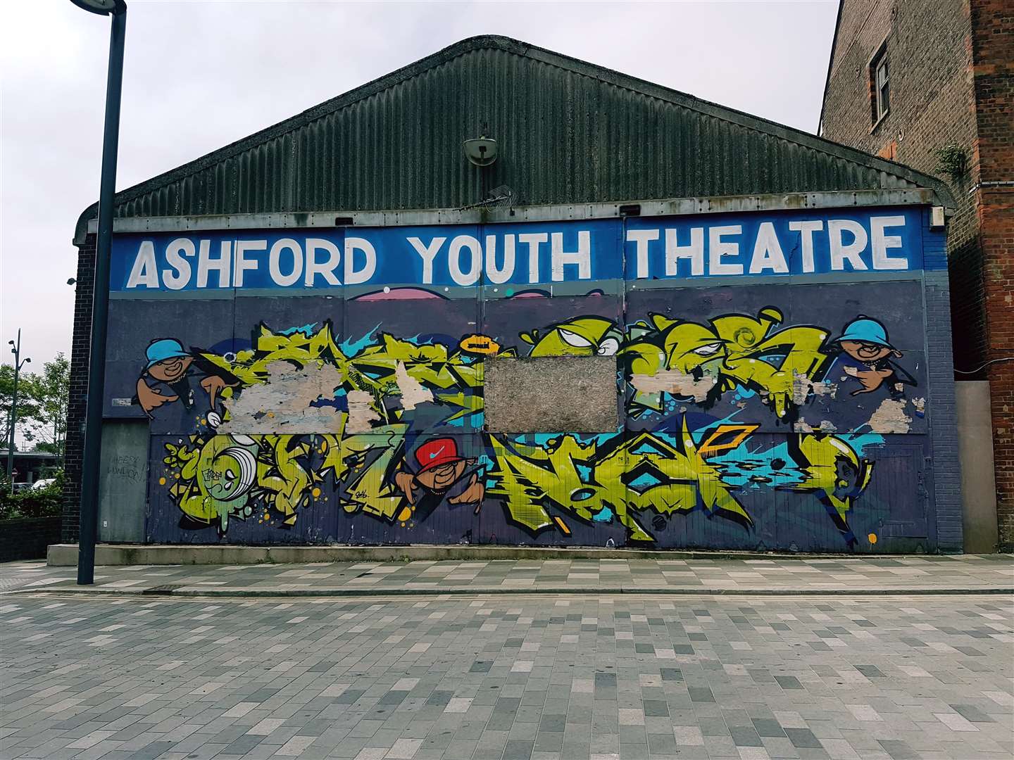 The exterior mural on Ashford Youth Theatre's old home at Dover Place.