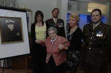 Patricial Stockwell with picture of her fallen hero son Geoffrey