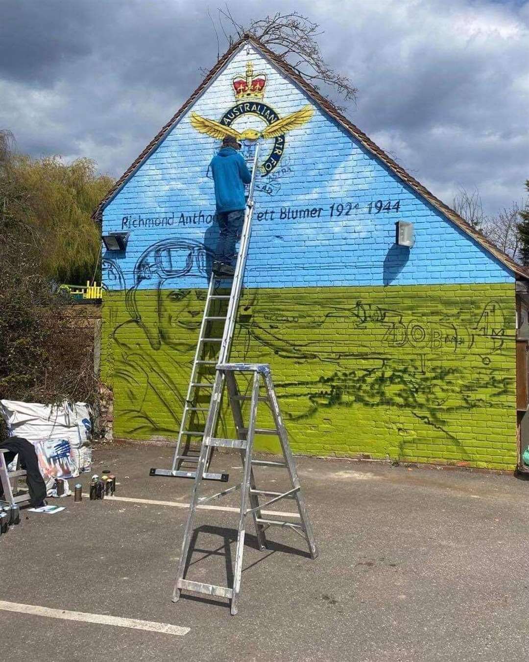 Graffiti artist Jonnie Barton working on the mural for Anthony Barrett Blumer at The Hop Pole Inn, Nettlestead Green, in April. Picture supplied by The Hop Pole Inn