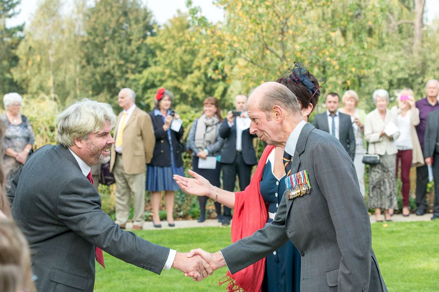 His Royal Highness, the Duke of Kent, shaking hands with sculptor Guy Portelli