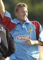 REASON TO CELEBRATE: Dennington takes a wicket against Hampshire earlier in the season. Picture: MATT WALKER