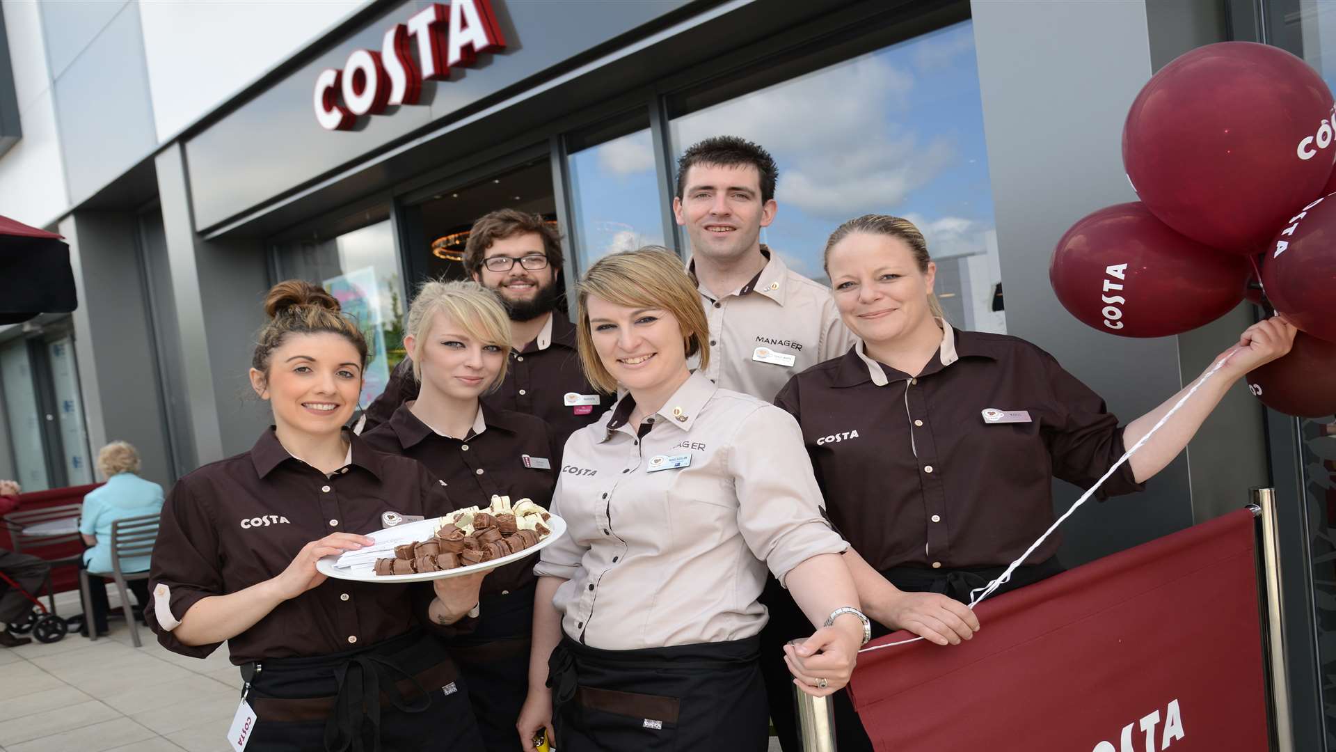 Manager Rosa Barlow and staff celebrate the opening of Costa at Sevington Retail park.