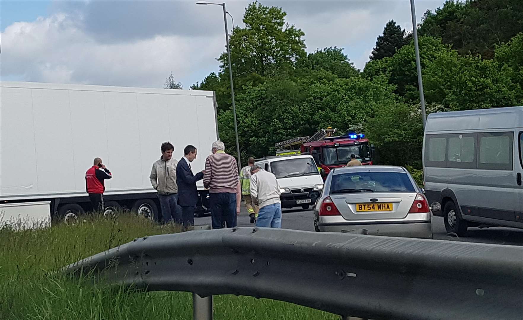 Firefighters and police were called to the crash at roundabout for junction eight of the M20